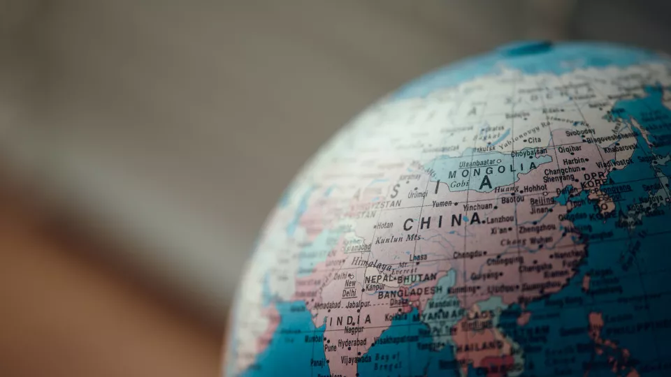 photo of a globe with China in focus