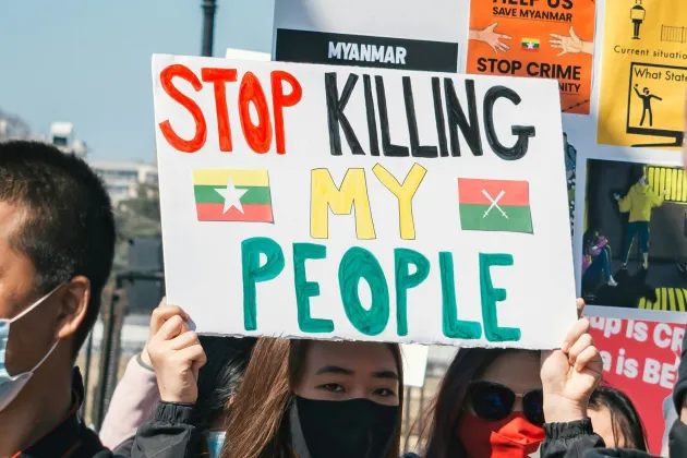 gayatri-malhotra-RIu4W3BC99A-unsplash.jpg A group of people holding a sign Stop Killing My People. Photo by Gayatri Malhotra on Unsplash.