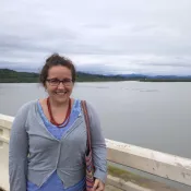 Photo of Elizabeth Rhoads with river in background