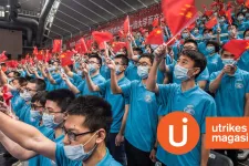 chinese young men wearing masks and waving the Chinese flag