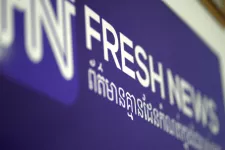 blue sign that says "fresh news". photo